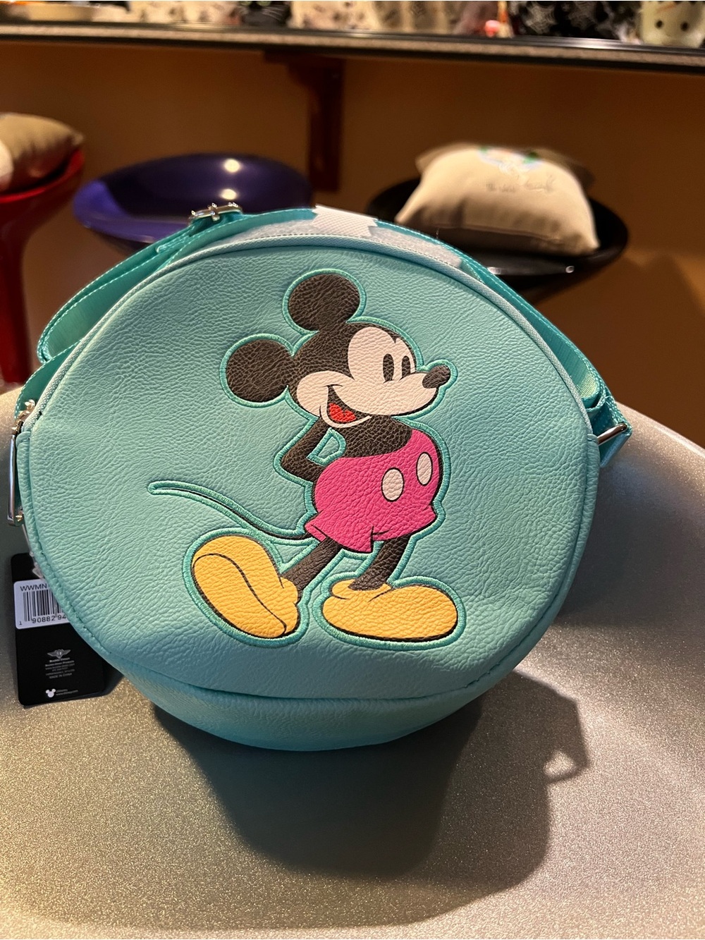 Buckle-Down Teal Round Crossbody Bag with Mickey Patch and Pink, Yellow Accents